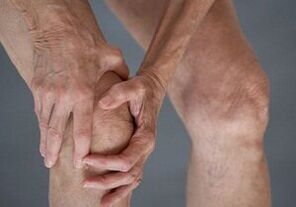 How is arthrosis of the knee joint manifested