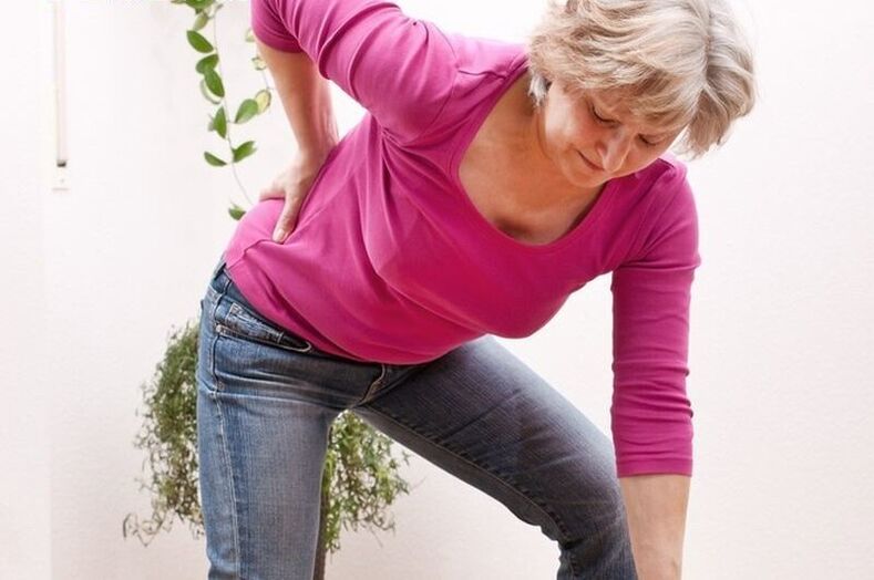 pain in the lower back due to osteochondrosis